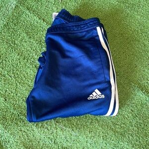 Classic Adidas track pants with zipper on pockets.climaxcool size XS